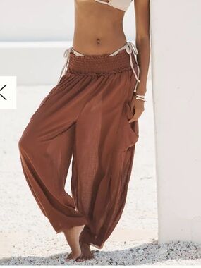 Anthropologie Rust Brown Smocked bottoms